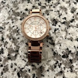 Rose gold Michael Kohrs Watch.